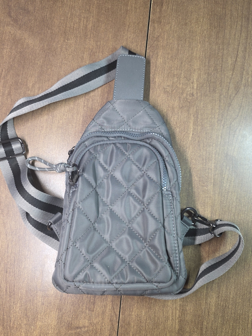 Quilted Gray Sling Belt Bag with Striped Strap